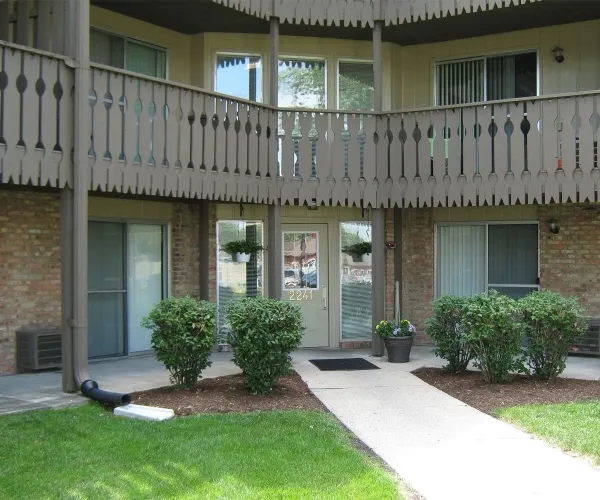 Leasing office entrance at 2241 with landscaped walkway
