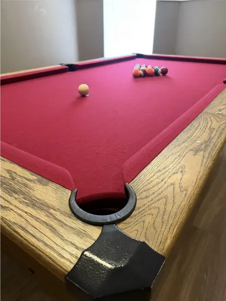 Billiards room with a pool table
